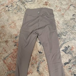 Like new high-waisted lululemon leggings. Only worn 4-5 times. Size 6
